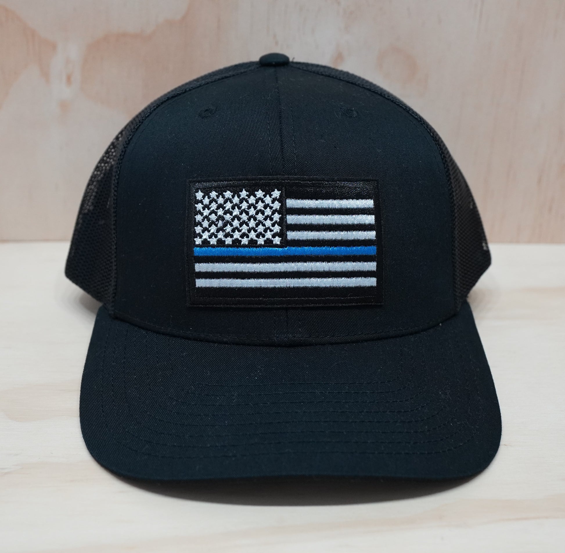 police blue stripe trucker hat